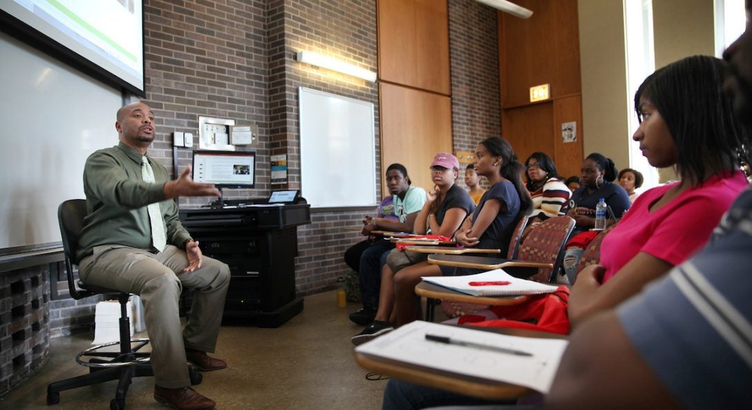 male teacher in front of class