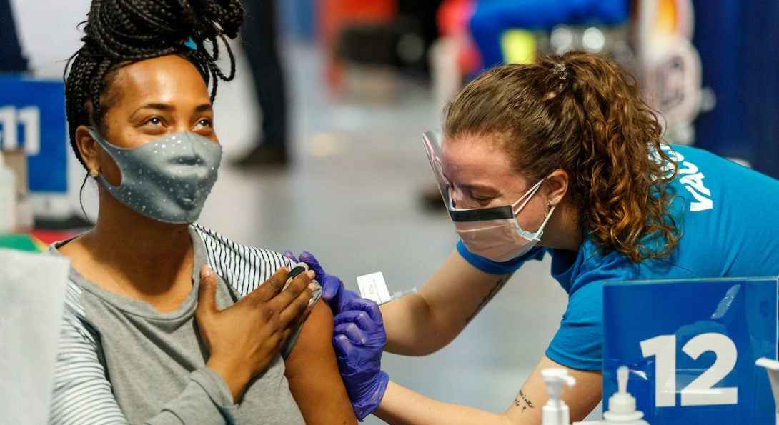 student receiving vaccination