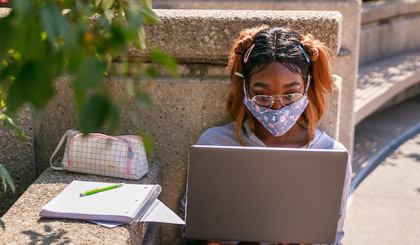 student using laptop