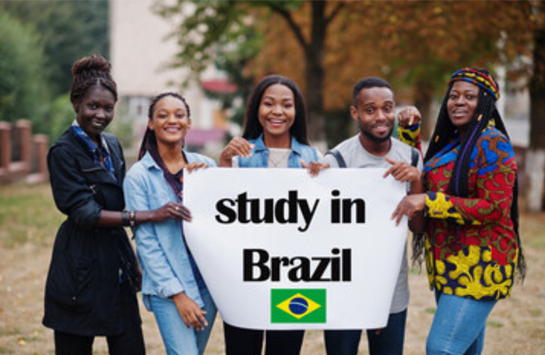 5 students holding a sign with the words study in brazil